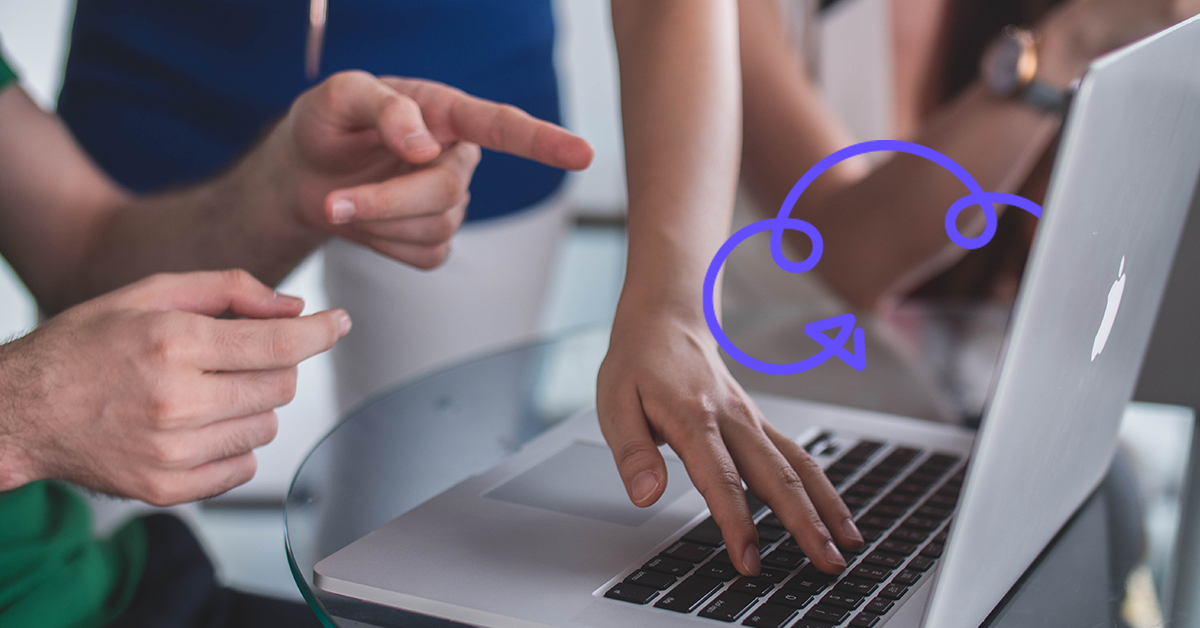 Team collaborating on a laptop about cloud networking challenges, with a cloud icon overlay on the screen