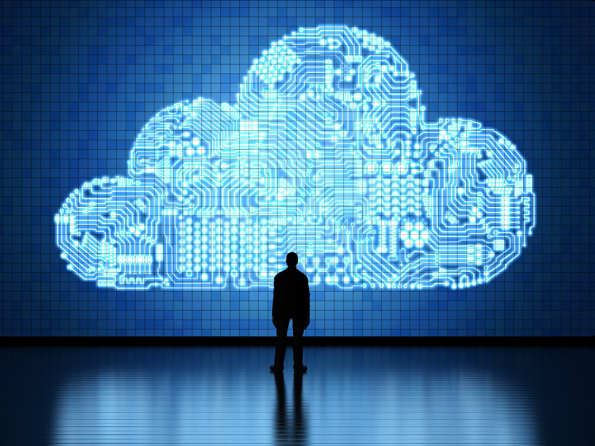 man standing in front of a digital cloud