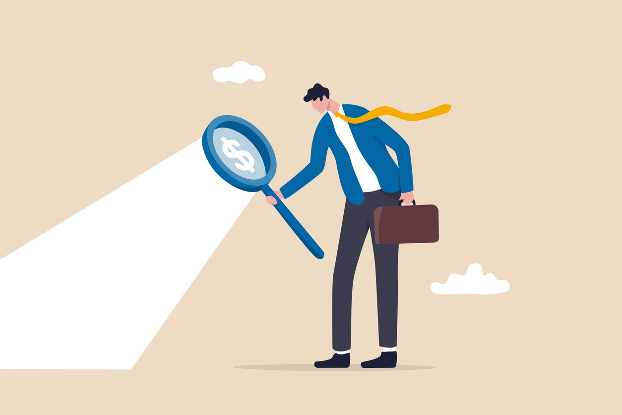 man holding a magnifying glass