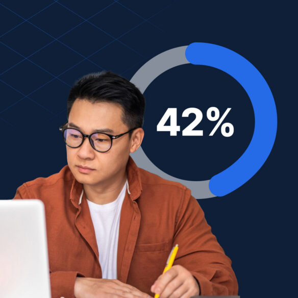 A man wearing glasses looks at a laptop while a bar chart graphic shows percentages for "Integrity Stream," "DDI Stream," and "Instructor-Led Stream."