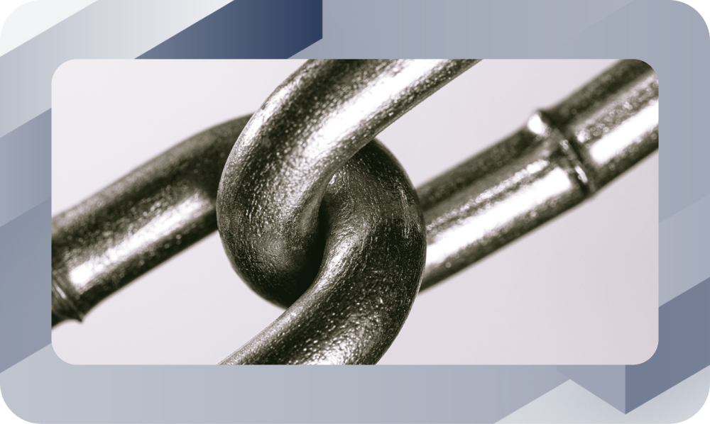 Close-up of interlocked metal chain links symbolizing connected network objects and relationships in IPAM